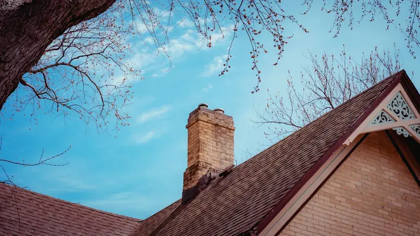 A substantial brick property with a pitched tiled roof in Brentwood