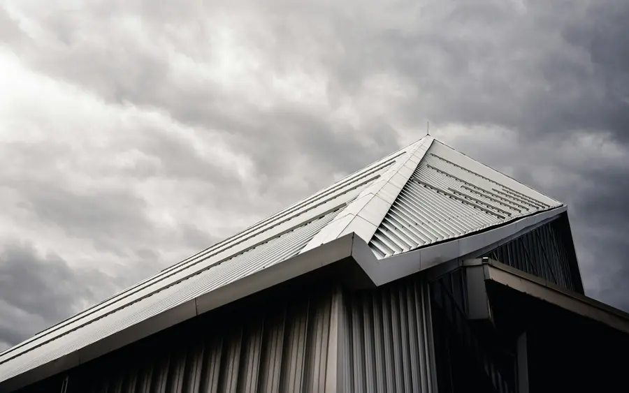 After: a clean, single-piece membrane roof with a crisp new finish